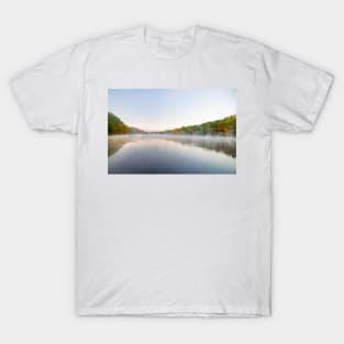 Scenic early morning fog just above the water level of Connecticut River with colorful fall foliage along both sides converging into distance. T-Shirt